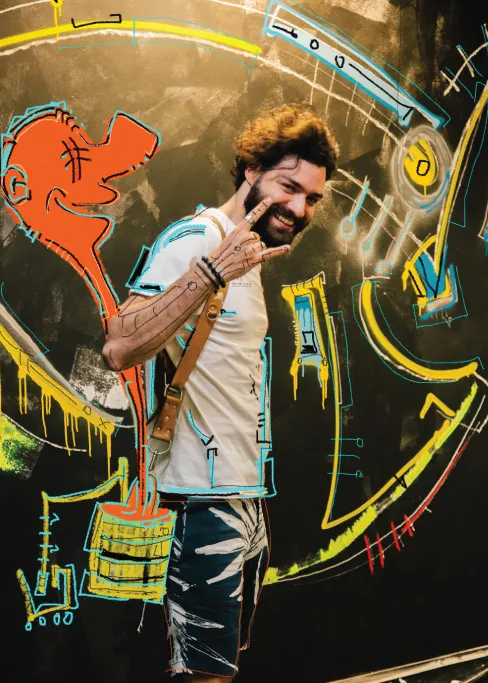 Foto do artista plástico Samuel Caixeta em seu ateliê